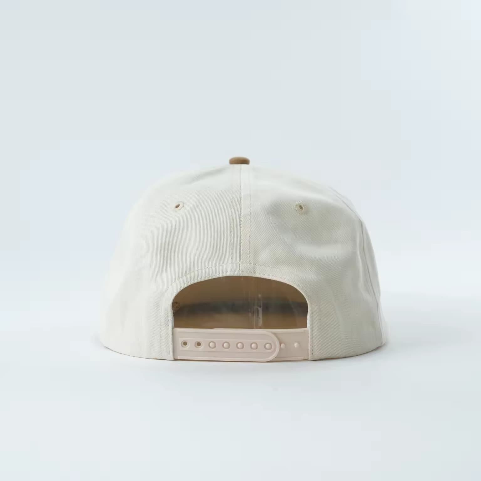 Lucky Beau 5-Panel Cap front, natural cotton crown with camel suede brim and raised gold Lucky Beau script