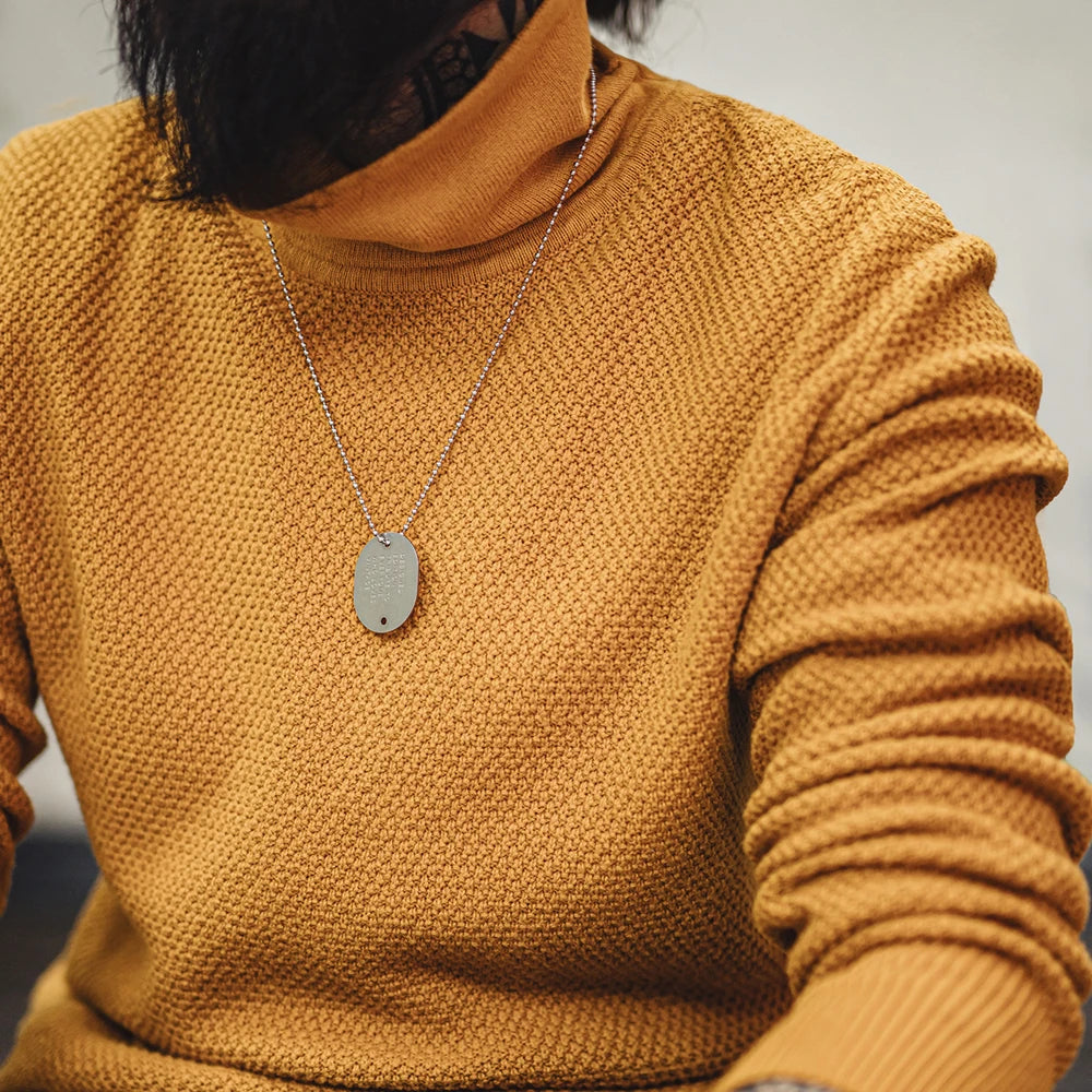 STRENGTH TURTLENECK SWEATER